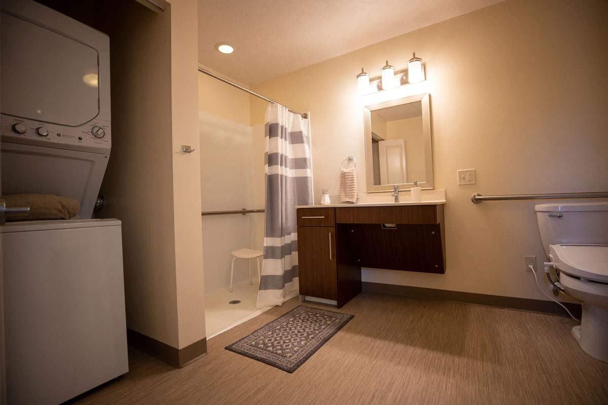 resident bathroom with laundry