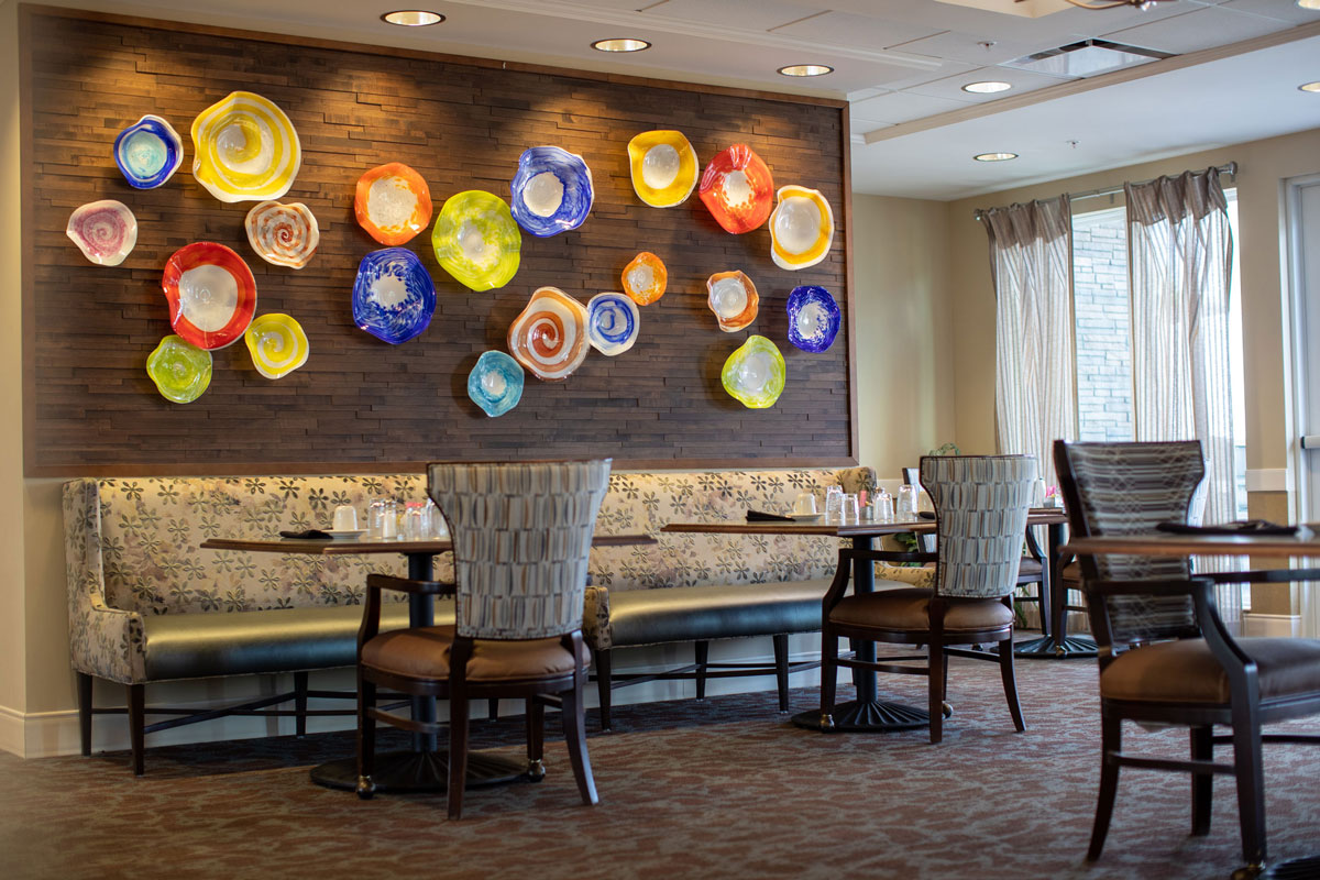 dining area with ceramic art on wall